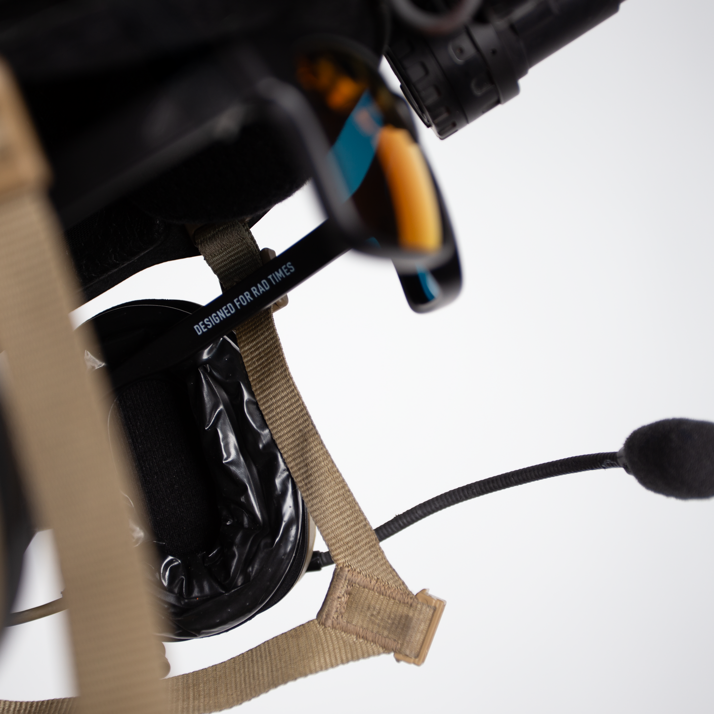 Close-up of a tactical headset with microphone on a white background