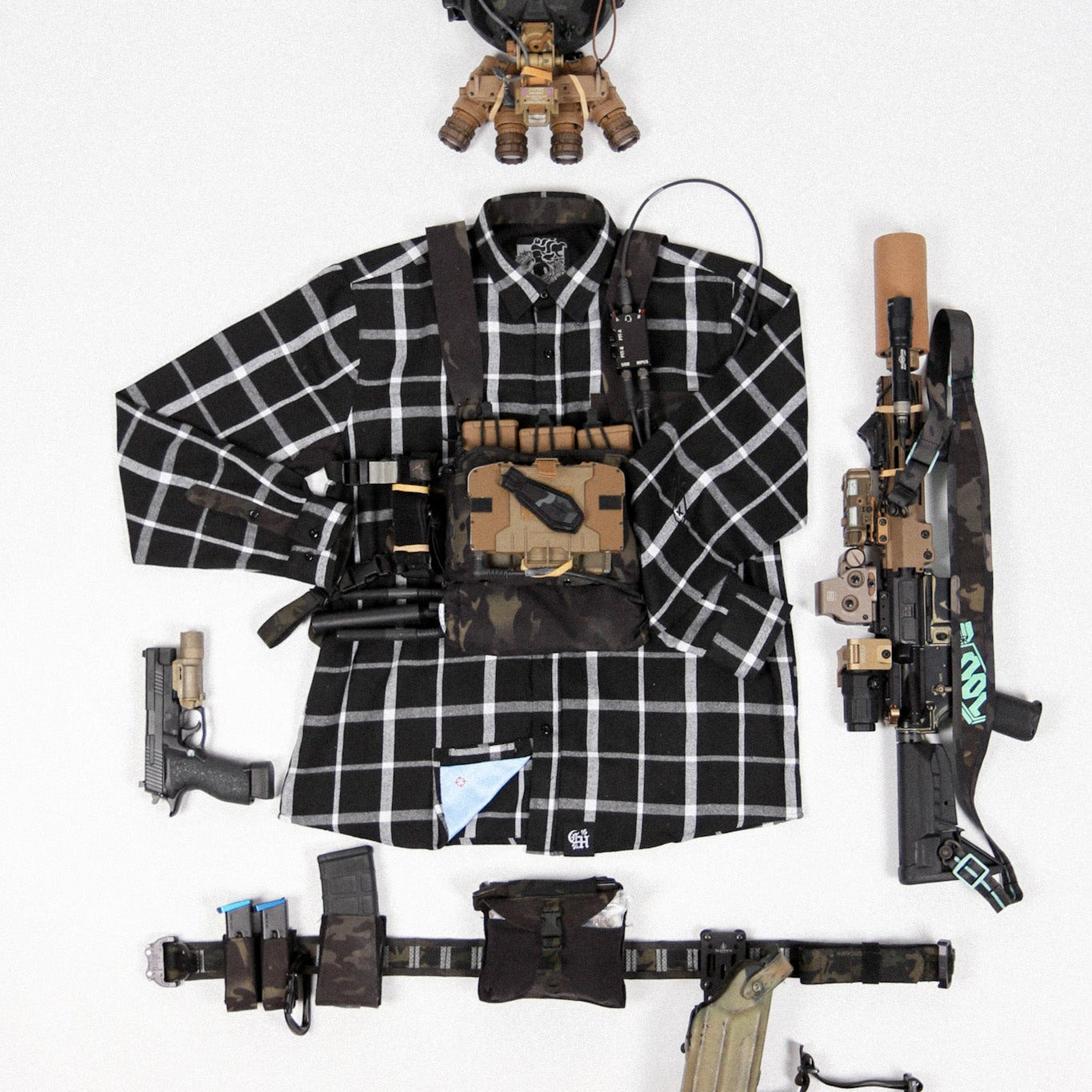 Collection of tactical gear including a vest, helmet, gloves, and weapons on a white background