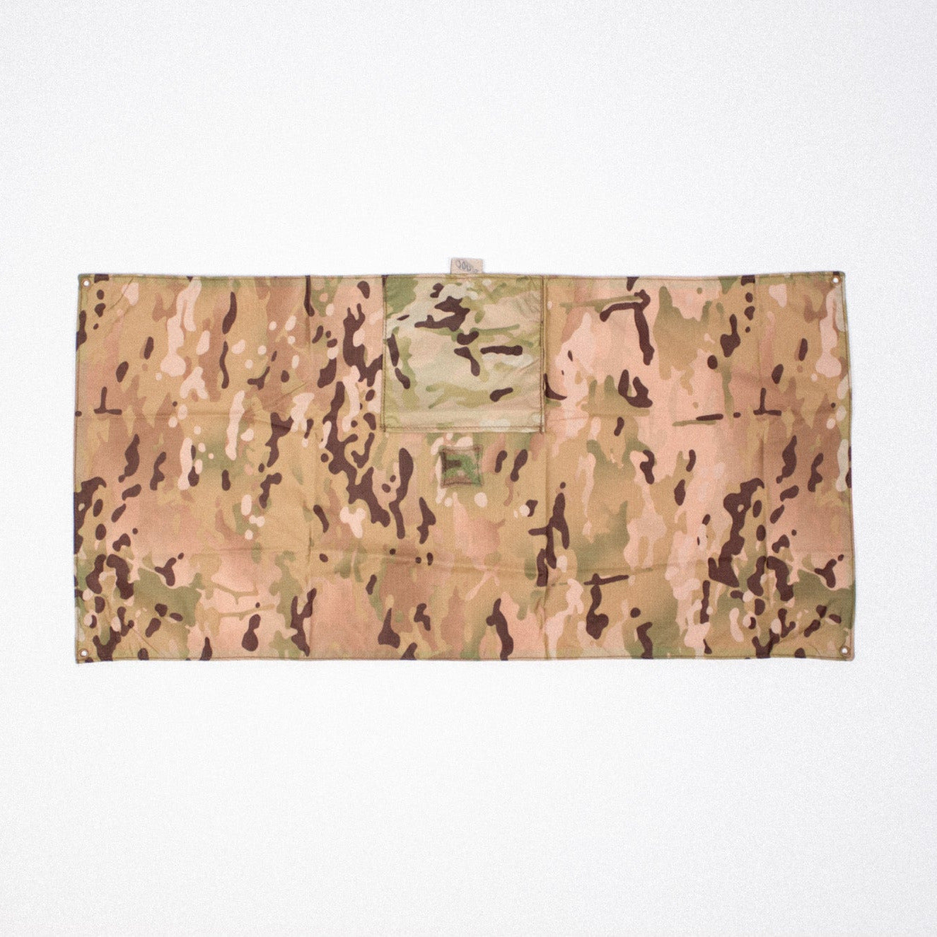 Camouflage-patterned fabric on a white background